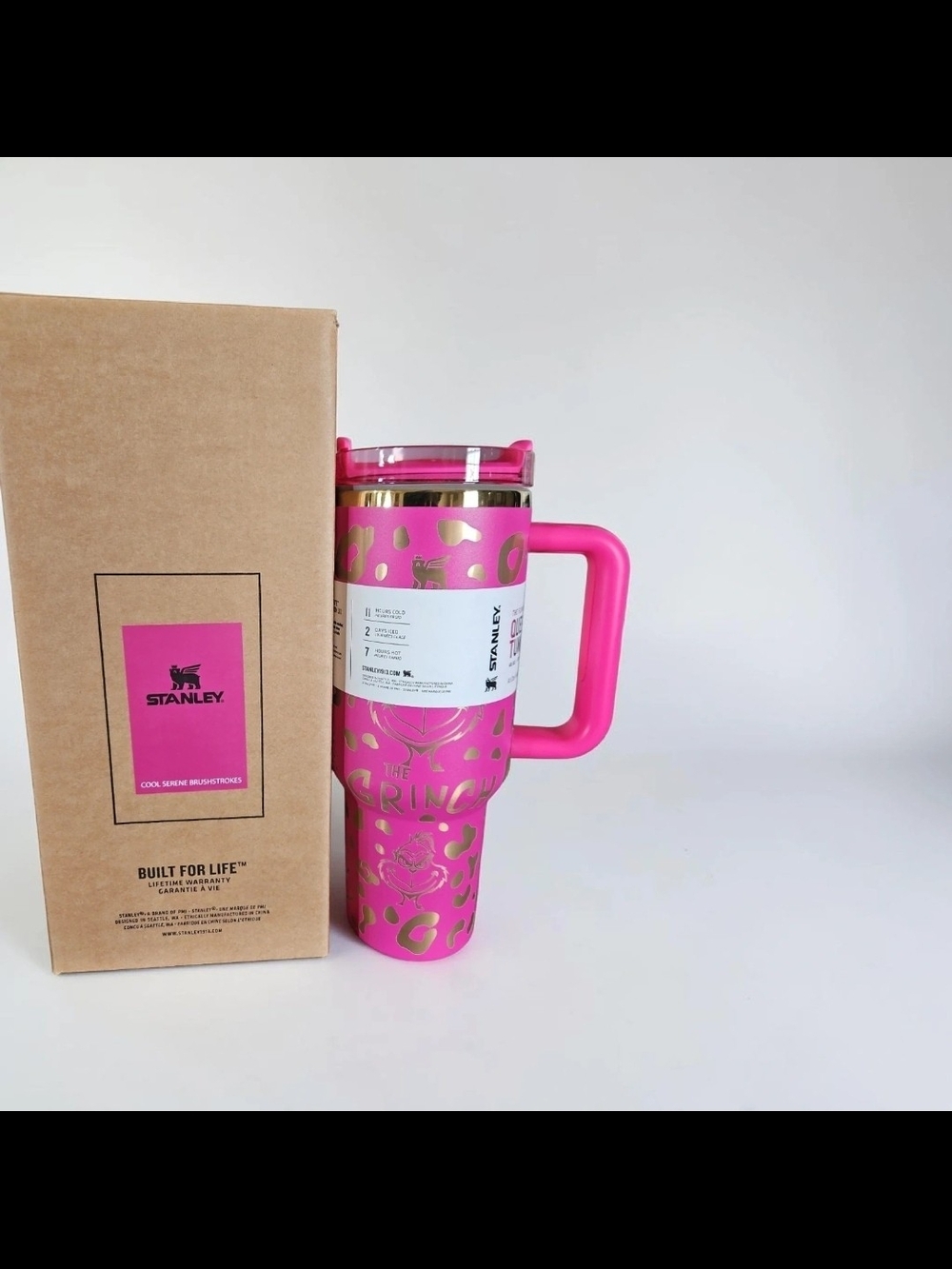Stanley Hot Pink Travel Mug with Gold Grinch Design